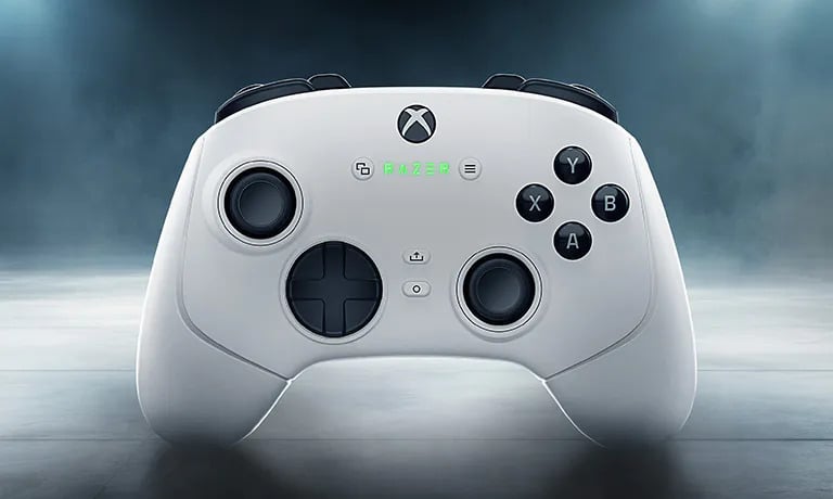 Front view of the white Razer Wolverine V3 Pro controller with green LED logo and Xbox-style layout