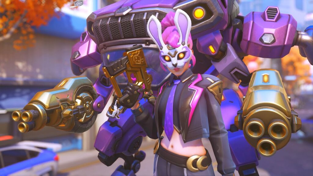 D.Va  in a bunny mask with a pink mohawk holds a golden gun, standing confidently in front of a large purple mech