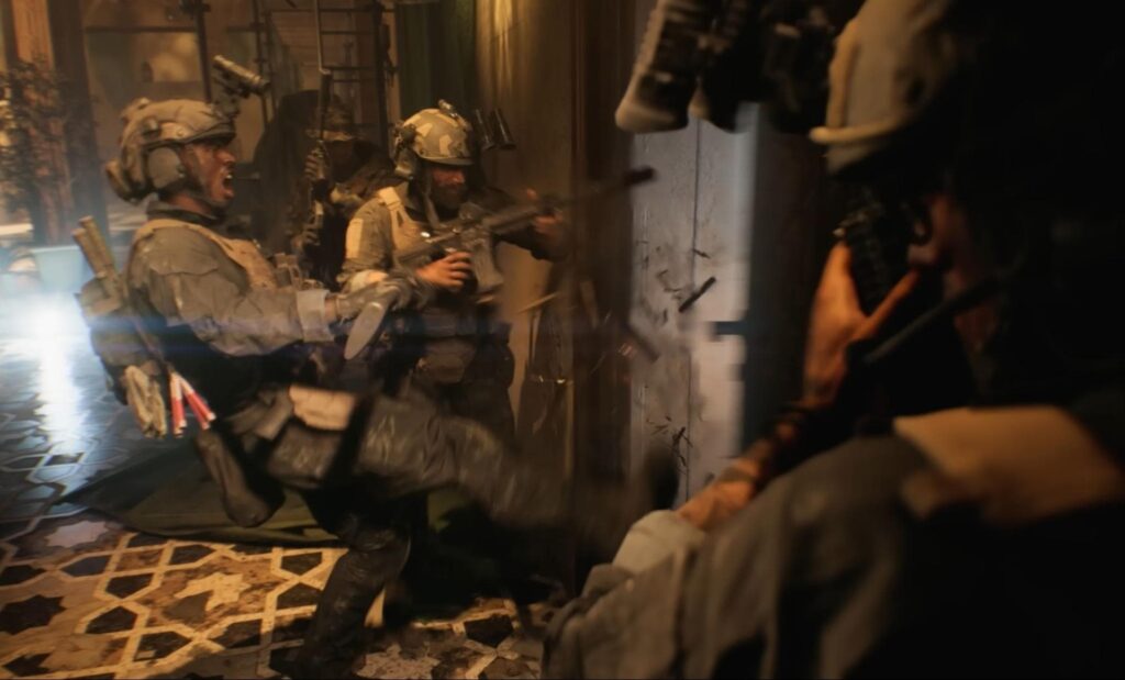 Soldiers breaching a door during a mission in the Battlefield 6 campaign mode