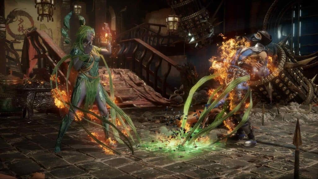 Poison Ivy battling Sub-Zero with fiery attack in Mortal Kombat 11