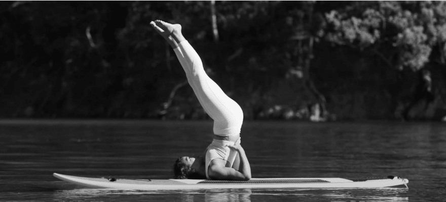 Freedom of Mind and Freedom of Money: Inside Costa Rica’s Growing Bitcoin Circular Economy 1 bitcoin circular economy, and a woman doing yoga on a surfboard in calm waters