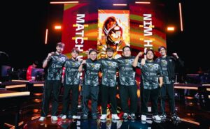 RRQ on stage after beating T1, punching their ticket to Tokyo.