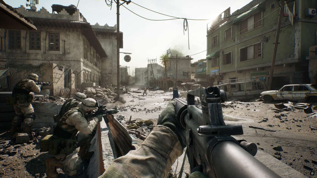 Soldiers aiming rifles in ruined city street