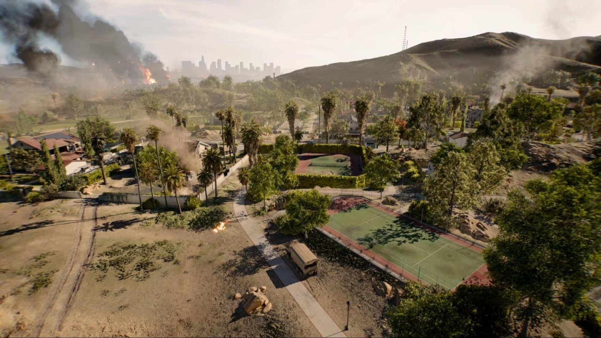 Aerial view of a verdant landscape with tennis courts, scattered trees, and distant hills in Battlefield 6