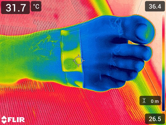 A thermal image shows a human foot during a test of extreme temperatures.